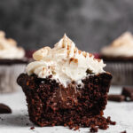 Close Up Of Halved Chocolate Cupcake With Ganache Filling