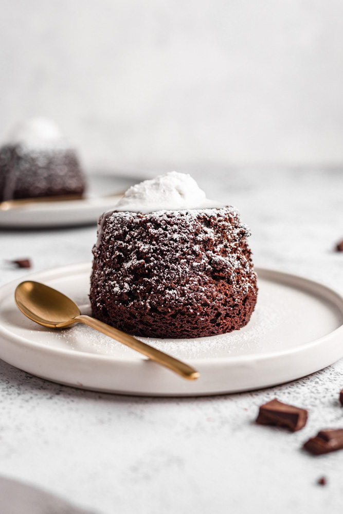 Vegan Chocolate Lava Cake Topped With Coconut Whipped Cream