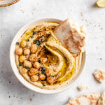 Pita Dipped In Hummus