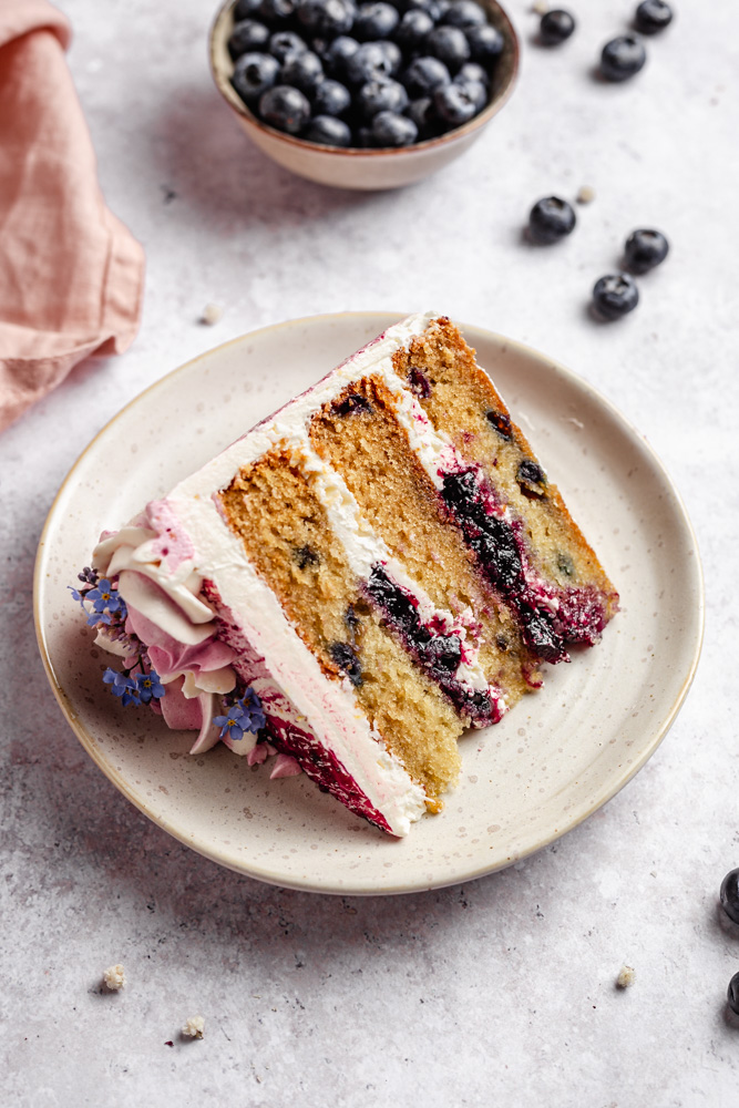 Slice of blueberry cake on a plate