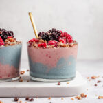 Cotton Candy Smoothie topped with granola and berries